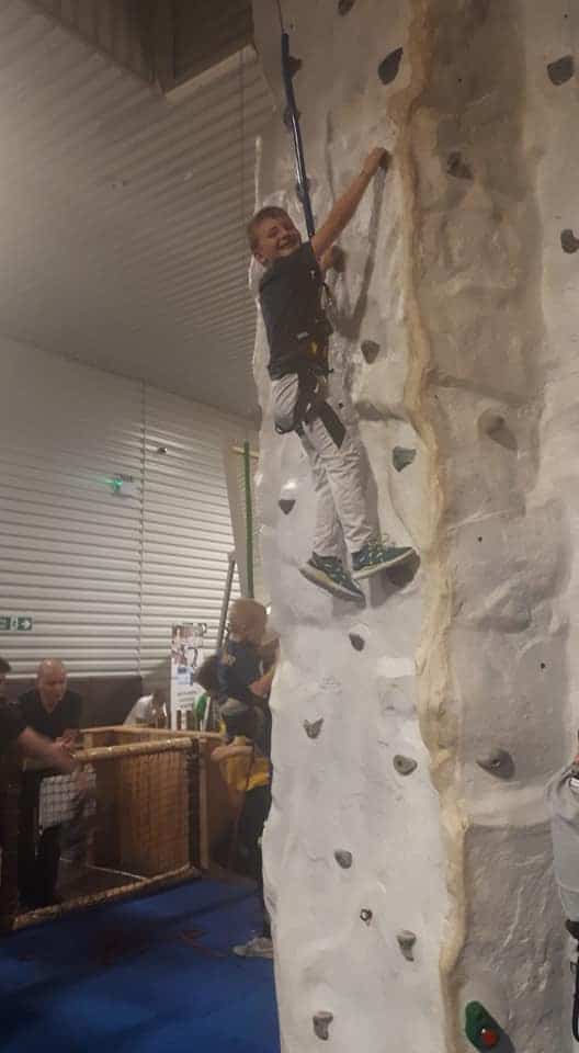 We Are Vertigo 2019 Event Boy On Climbing Wall